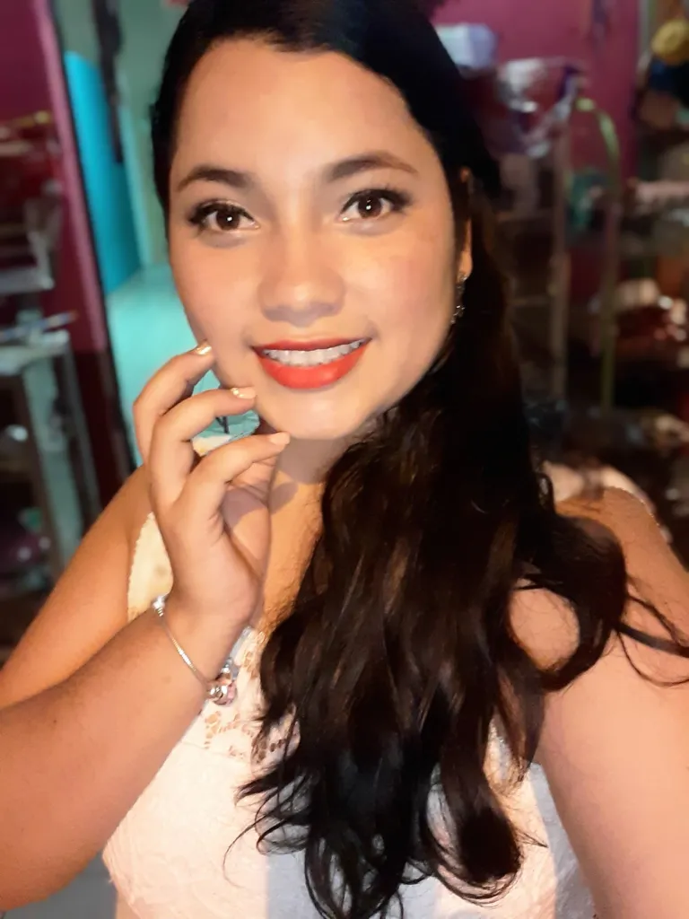 Helen Garay smiling at the camera.