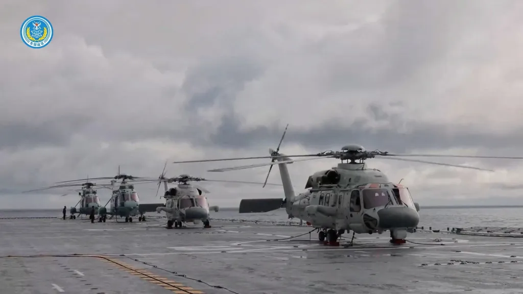 Helicopters on an amphibious assault ship during military drills southeast of Taiwan.