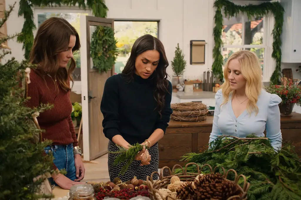 Meghan Markle making a wreath with two other women.