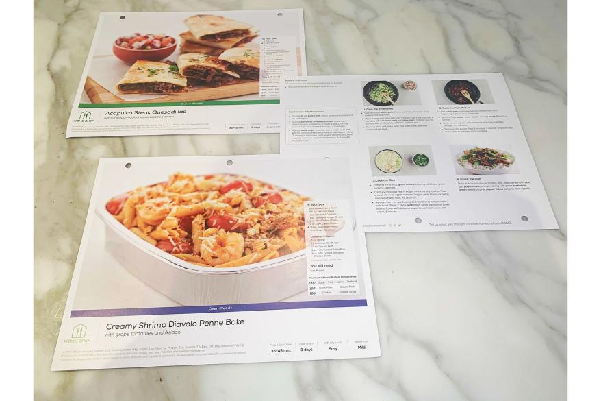 A group of papers spread out on a marble surface