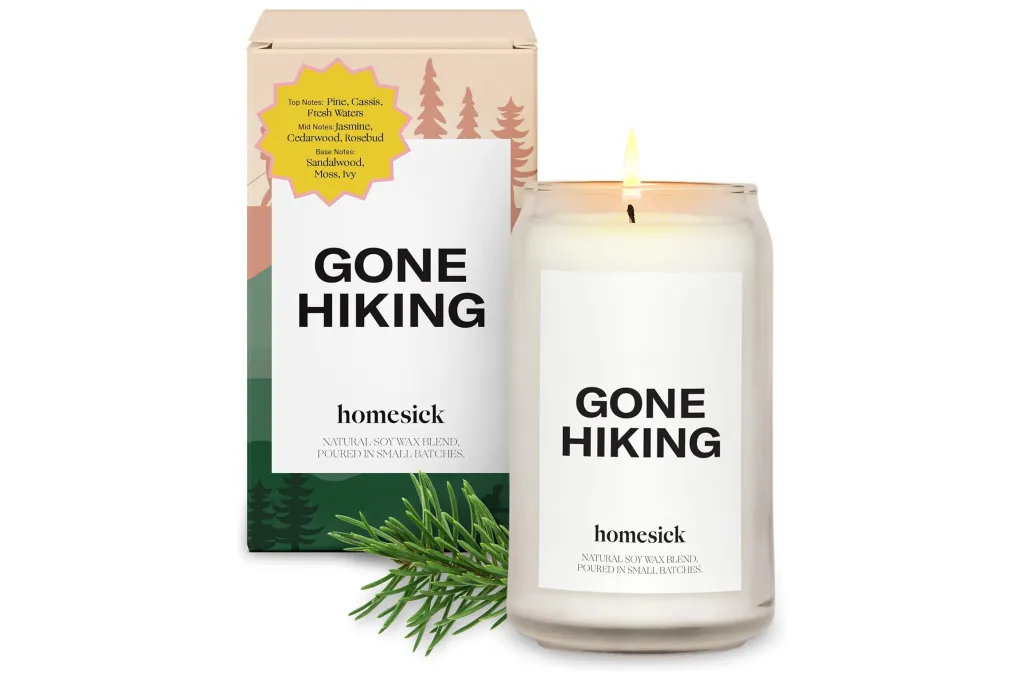 A candle next to a box