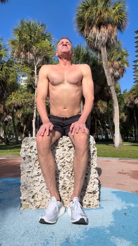 Man doing breathwork outdoors.