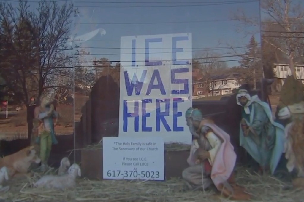 Nativity scene with a sign