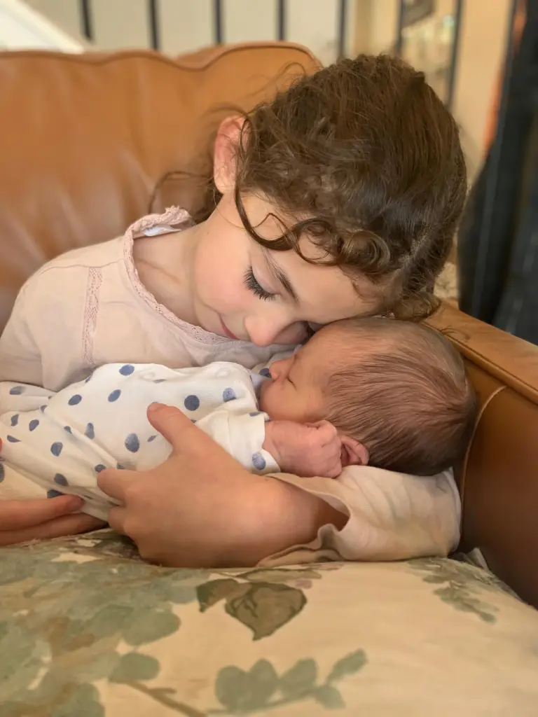 Melissa Carlton's children posing together.