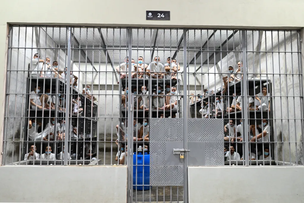 Inmates remain in their cell as Costa Rica's Minister of Security Gerald Campos tours the Centre for Terrorism Confinement (CECOT) during a visit organized by El Salvador's Presidency in Tecoluca, El Salvador, on April 4, 2025. (Photo by MARVIN RECINOS / AFP) (Photo by MARVIN RECINOS/AFP via Getty Images)
