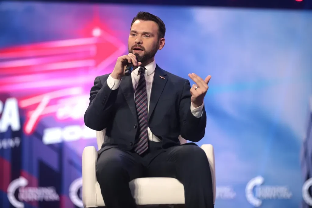 ​MAGA divided after right-wing influencer spotted in photo with ‘Jew-hating holocaust gag’