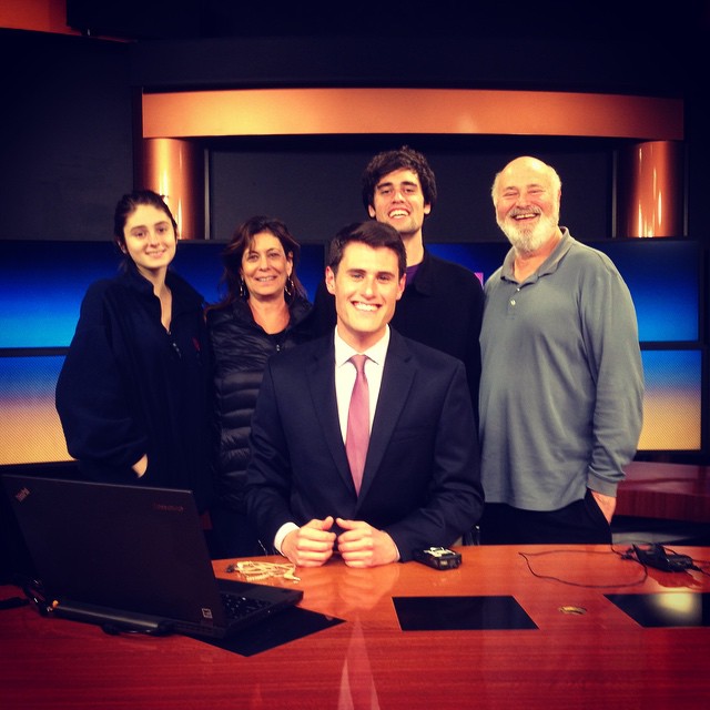 Jake Reiner with Michele, Nick, and Romy and Rob in a news studio.