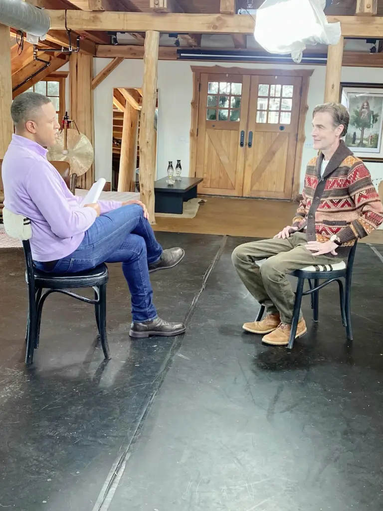 James Van Der Beek being interviewed.