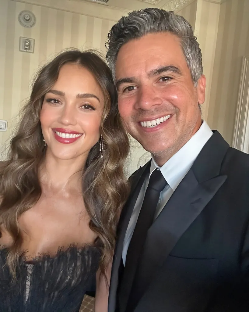 Jessica Alba and Cash Warren smiling together.