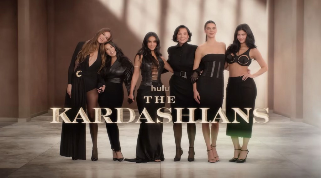 The Kardashian-Jenner family, including Kim, Kourtney, Khloé, Kris, Kendall, and Kylie, standing together.