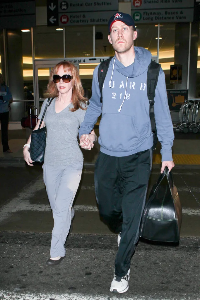 Kathy Griffin and Randy Bick holding hands at LAX.