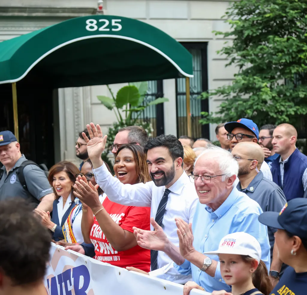 Kathy Hochul, Tish James, Zohran Mamdani, and Bernie Sanders marching in the 2025 NYC Labor Day Parade.