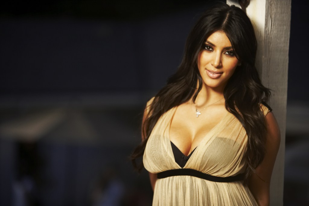 Kim Kardashian wearing a gold dress for 