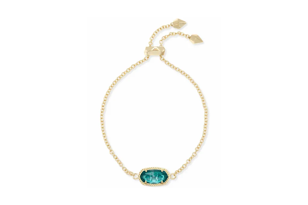 Gold chain bracelet with a blue stone from Kendra Scott