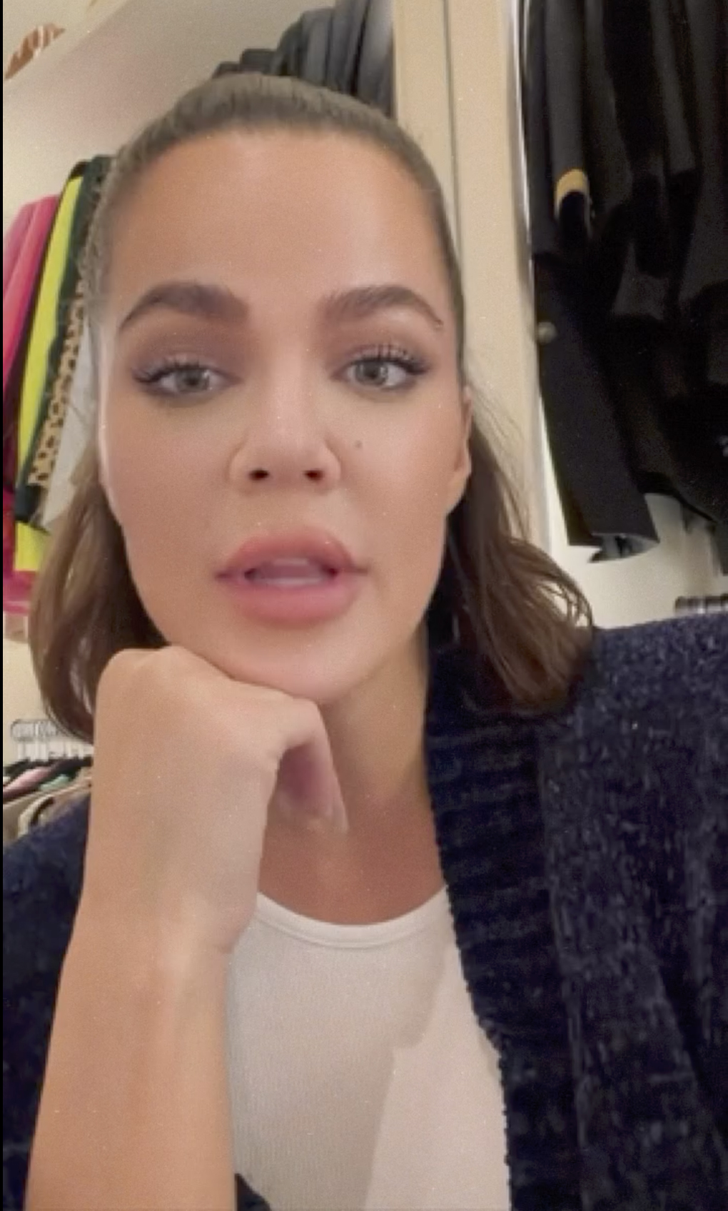 Khloé Kardashian in a close-up, looking at the camera.