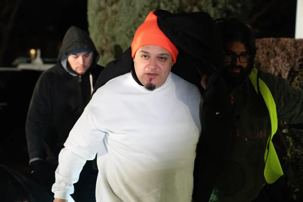 Kilmar Abrego García with two men, after being released from ICE custody.