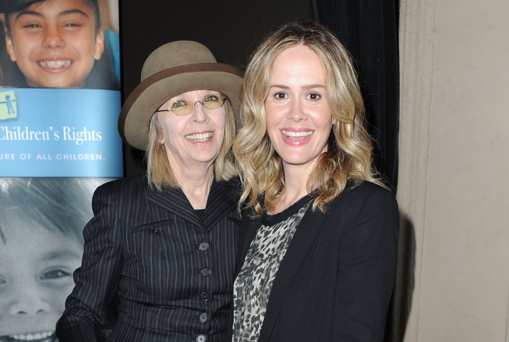 Actresses Diane Keaton and Sarah Paulson smiling together.