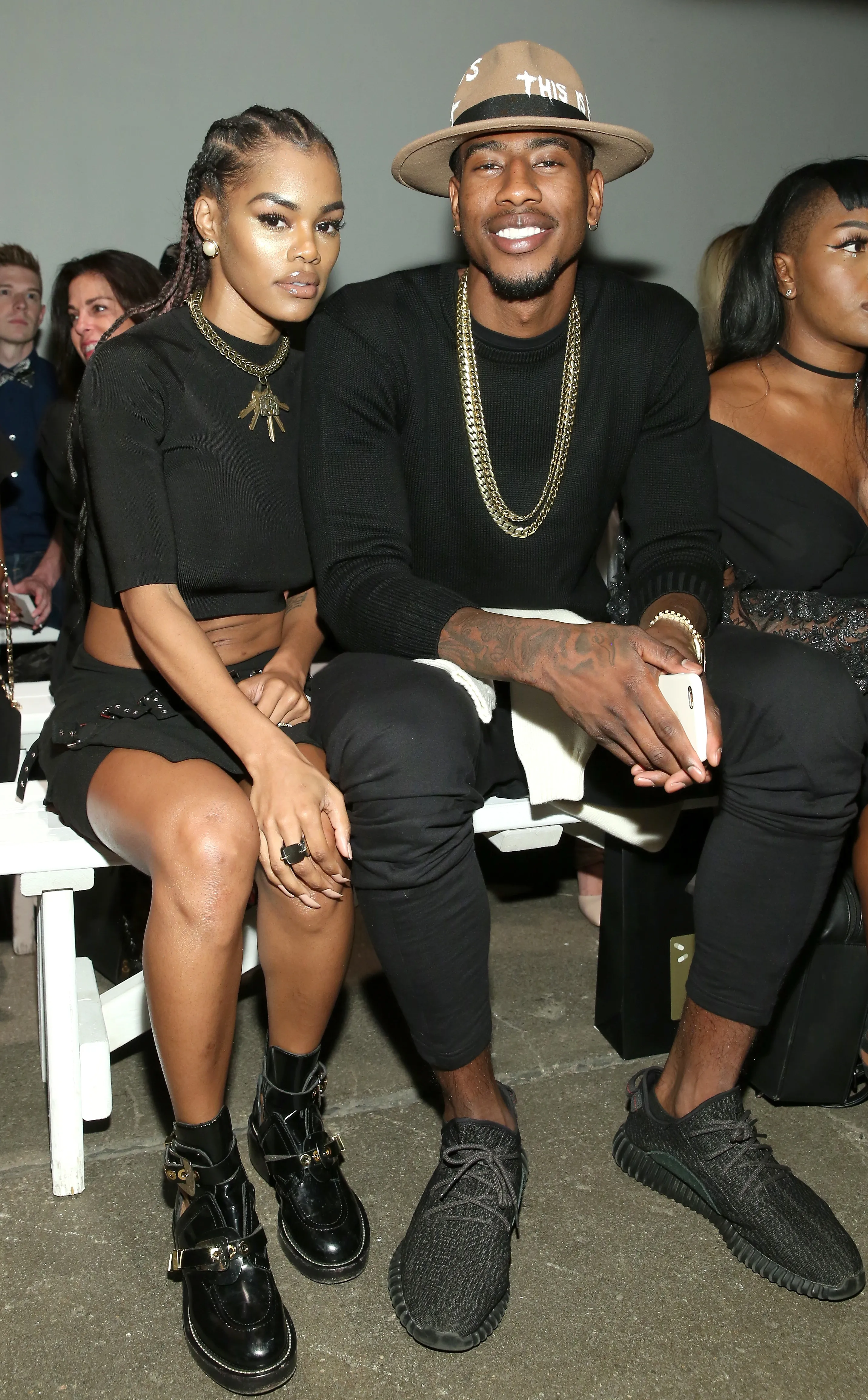 Teyana Taylor and Iman Shumpert attending a fashion show.