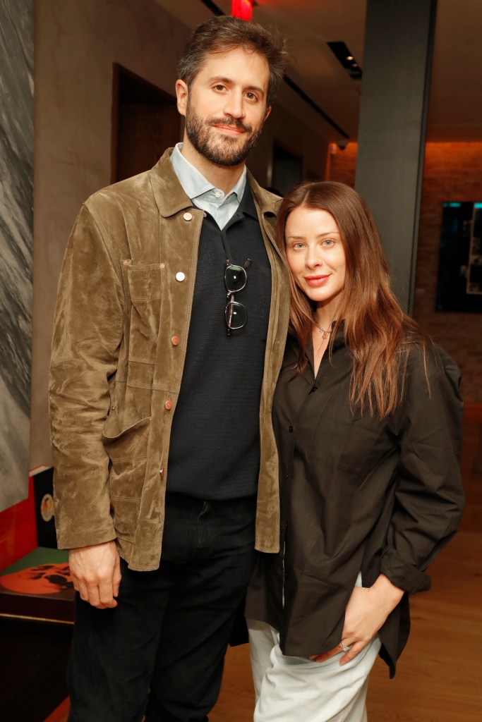 Daniella Pierson, CEO of Newsette, posing with a man in a brown jacket.