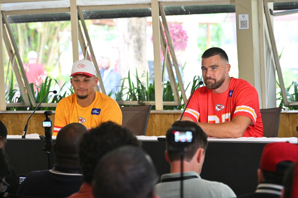 Kansas City Chiefs players Patrick Mahomes and Travis Kelce speaking to the media.