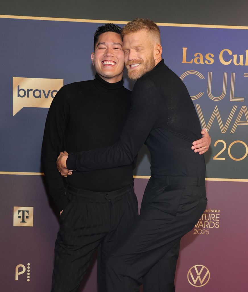 Mark Hoying and Scott Hoying of Pentatonix pose together in black outfits at the Las Culturistas Culture Awards.
