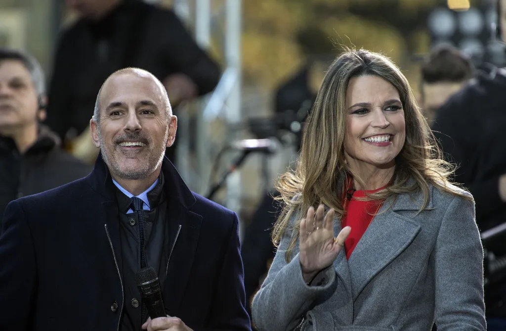 Matt Lauer and Savannah Guthrie smiling on NBC's Today