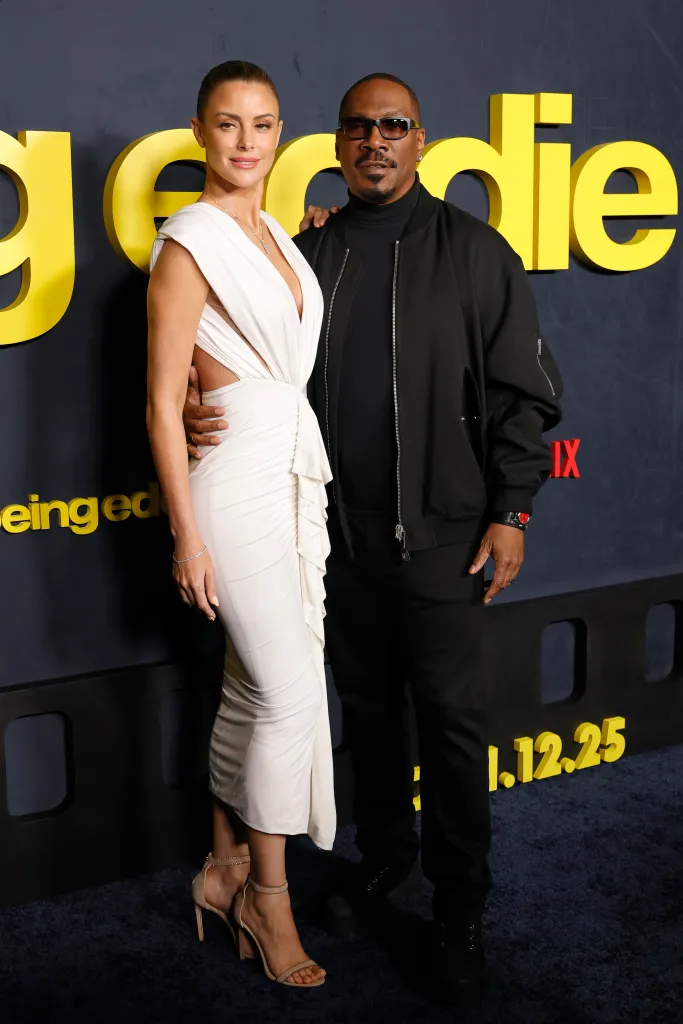 Eddie Murphy and his wife at a movie premiere.