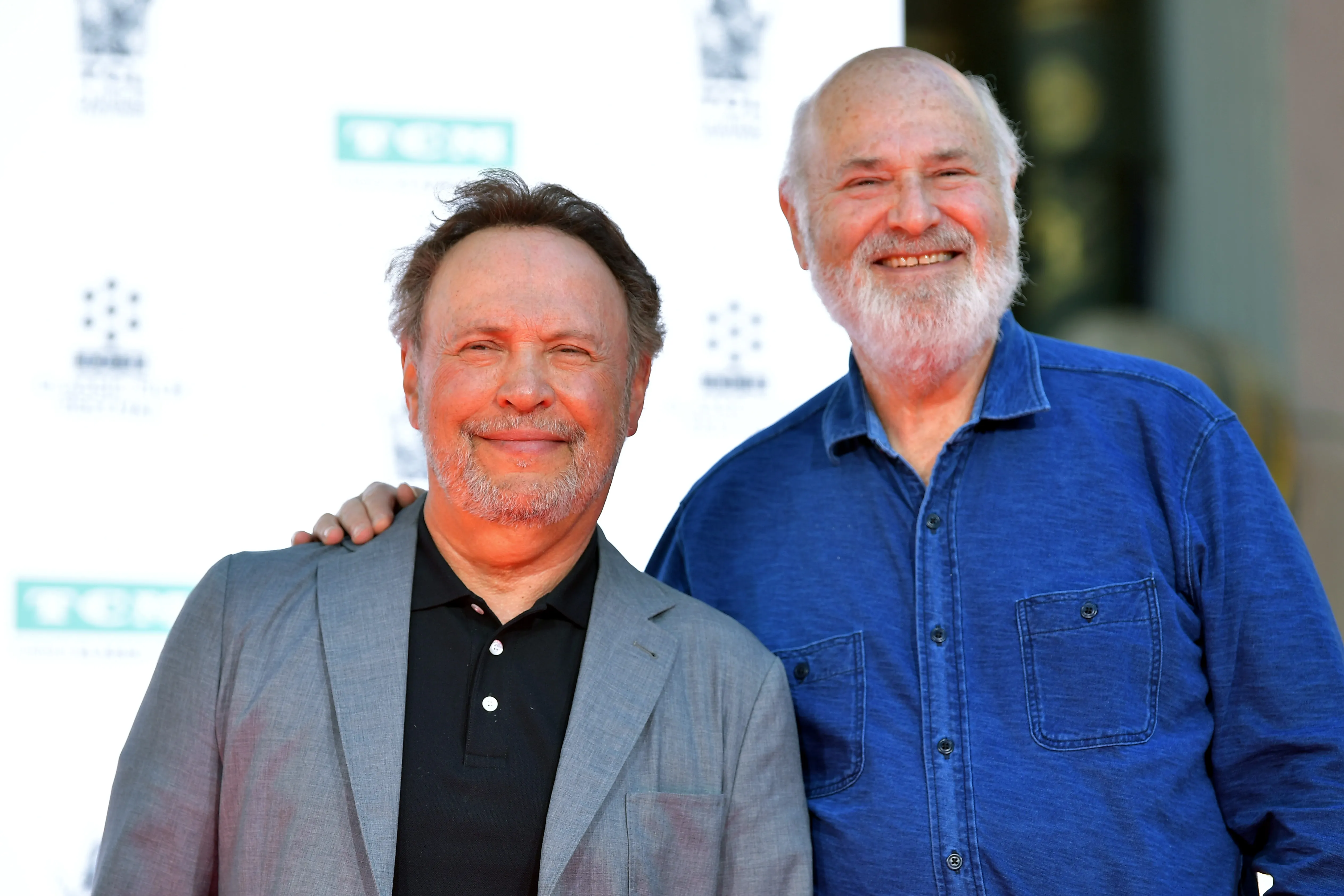 Billy Crystal and Rob Reiner attend the Hand and Footprint Ceremony: Billy Crystal at the 2019 10th Annual TCM Classic Film Festival on April 12, 2019 in Hollywood, California.