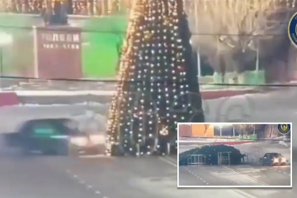 Joyride ends in disaster as driver smashes into towering Christmas tree in Kazakhstan – and is ordered to fix it