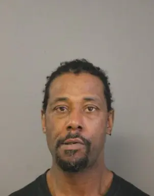 Mugshot of Lawrence Reed.