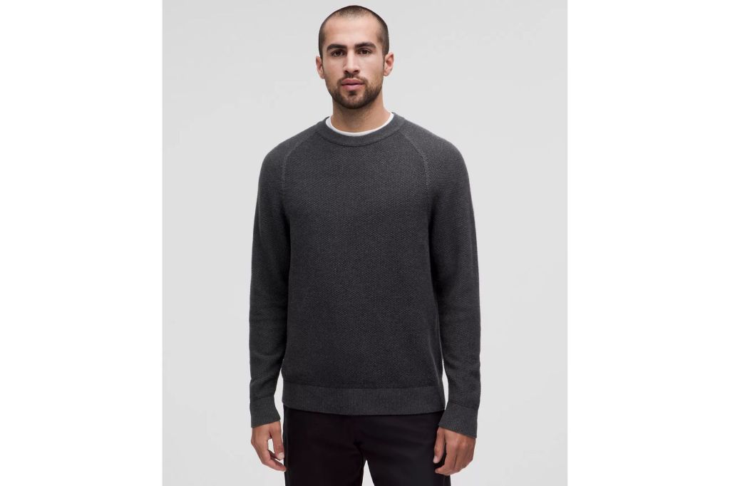 A man wearing a sweater