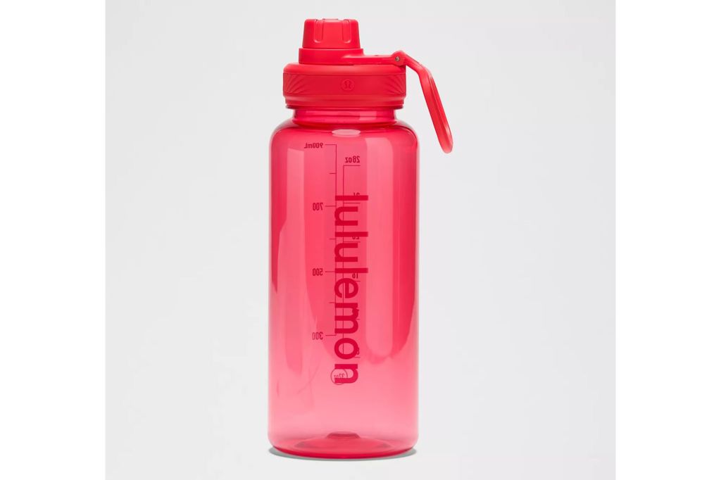 A clear water bottle in the color pink.