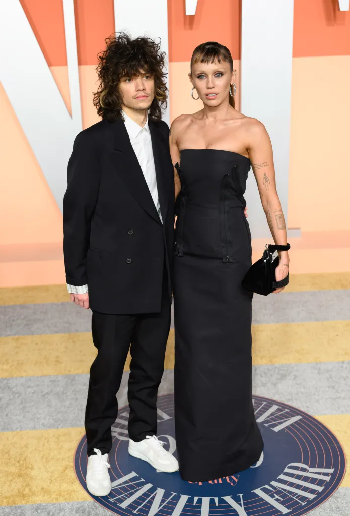 Maxx Morando and Miley Cyrus attend the Vanity Fair Oscar Party.