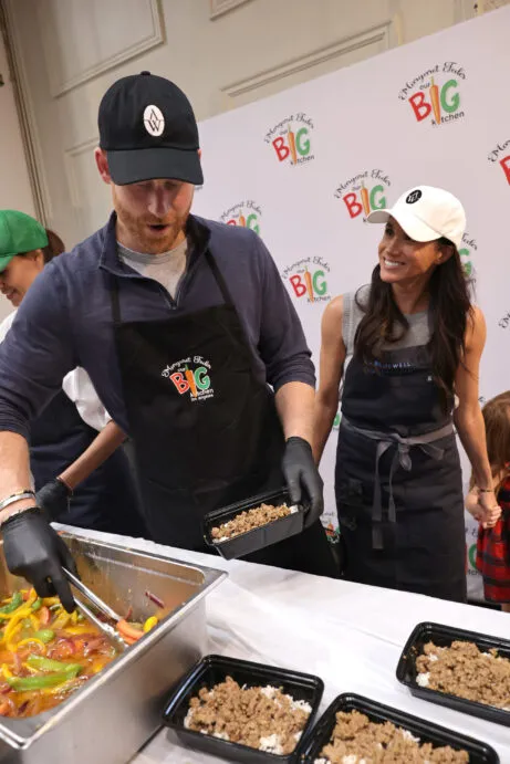 Prince Harry and Meghan Markle volunteer with their children in November. 