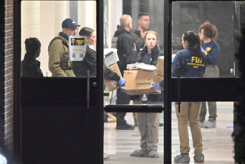 FBI Evidence Response Team members collecting evidence after a mass shooting at Brown University.