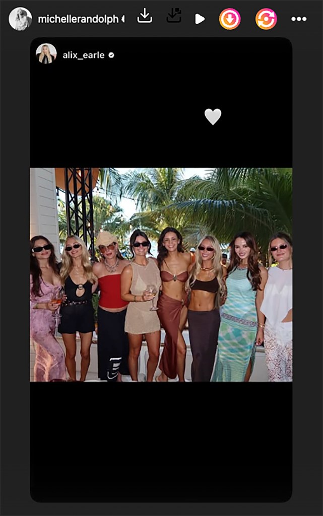 Michelle Randolph and Alix Earle with a group of friends in tropical attire.