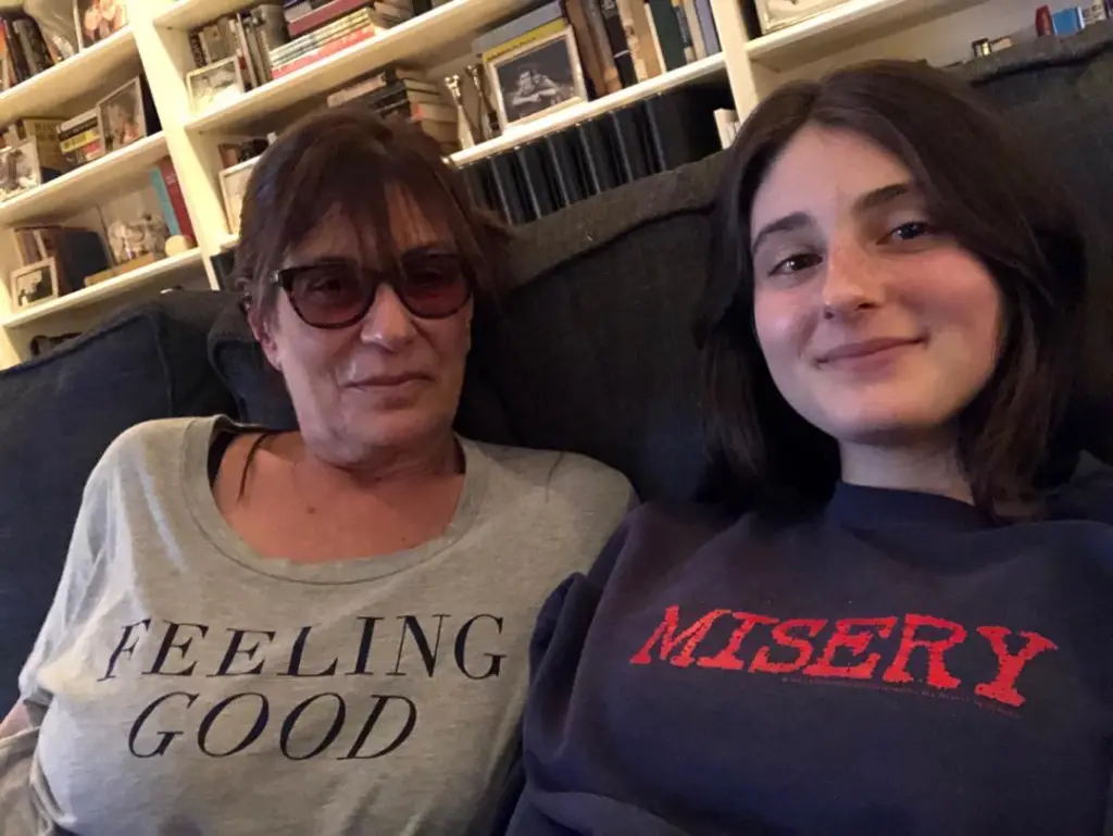 Michelle Reiner and Romy Reiner on a couch.
