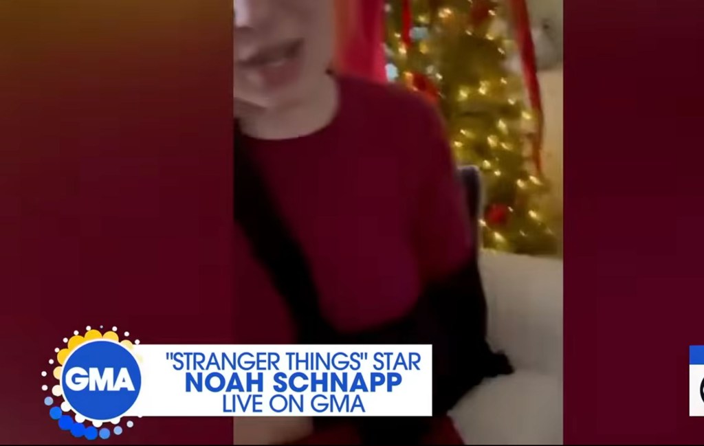 Millie Bobby Brown shows her arm in a sling