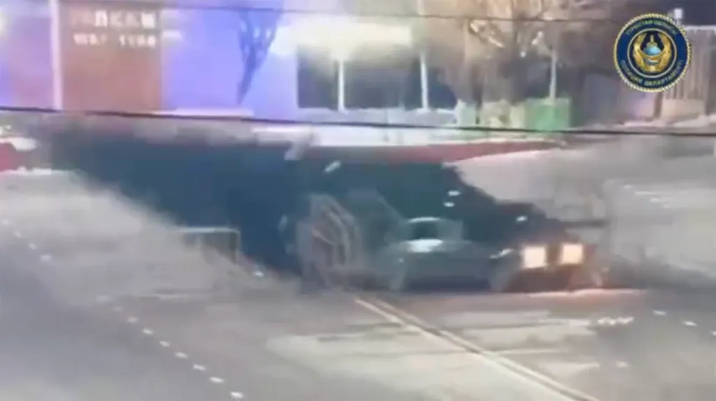 A car crashed into a 40-foot Christmas tree in Saryagash, Kazakhstan.