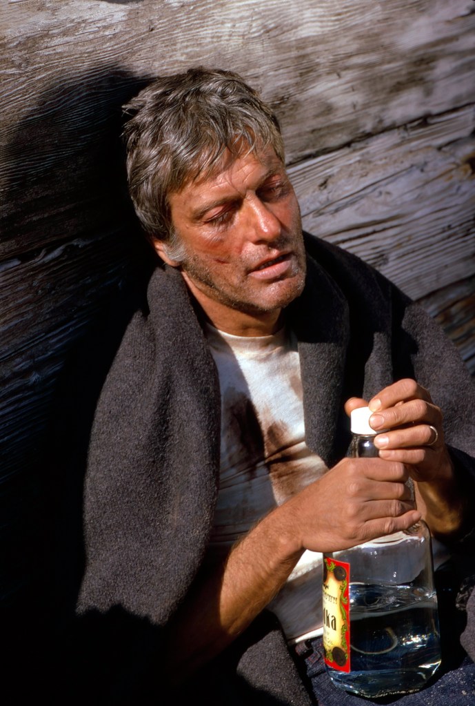 Dick Van Dyke as an alcoholic with a bottle of vodka in a scene from 