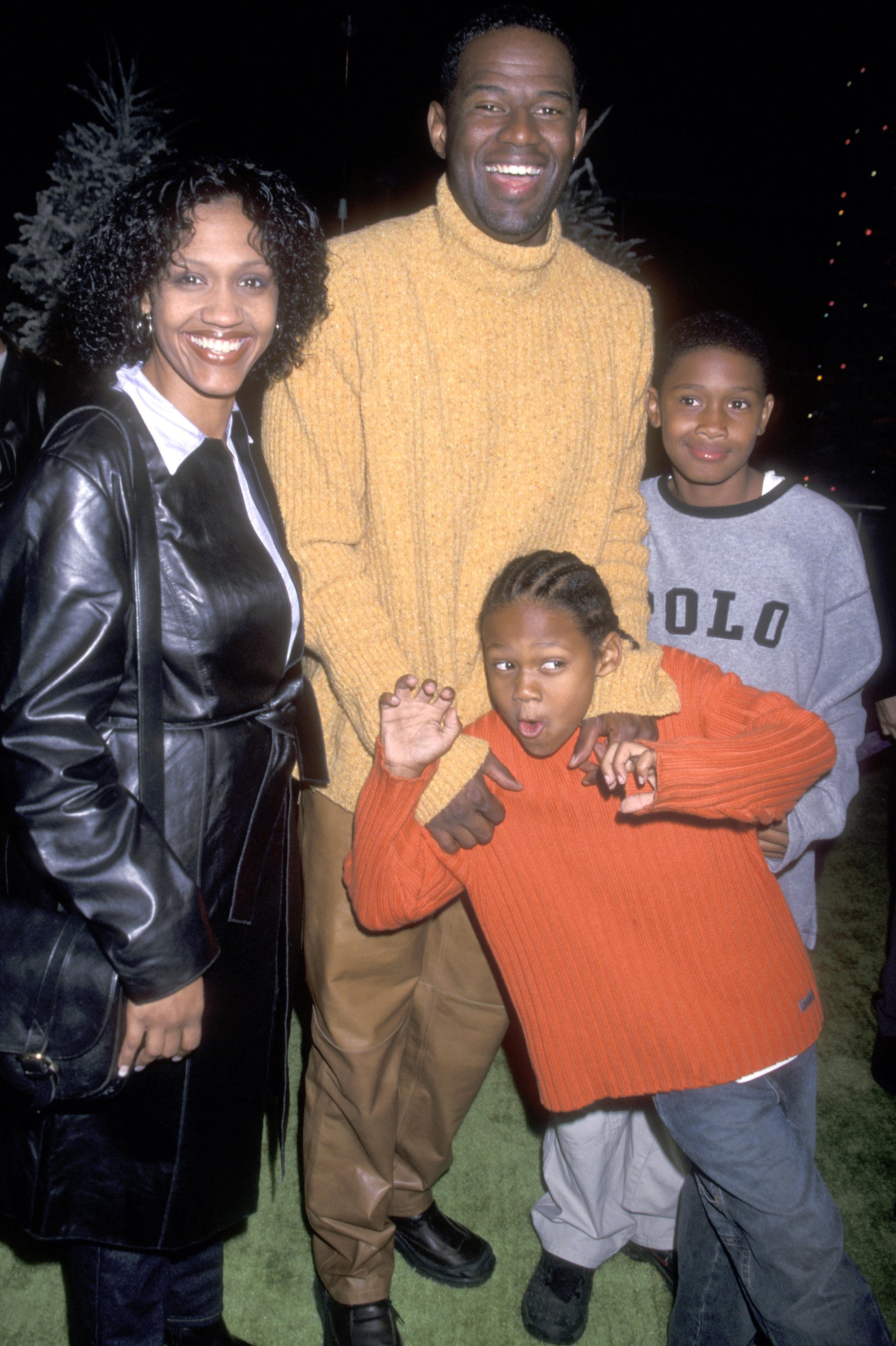 Brian McKnight and wife Julie McKnight with their sons Nikko McKnight and Brian McKnight, Jr. at 