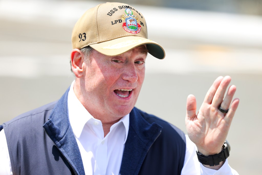 Navy Secretary John Phelan speaking to the media.