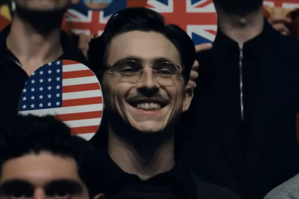 An image collage containing 1 images, Image 1 shows Marty Supreme holds an American flag fan, surrounded by others holding flags