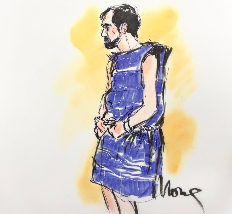Illustration of Nick Reiner in a blue suicide smock, standing with hands behind his back.