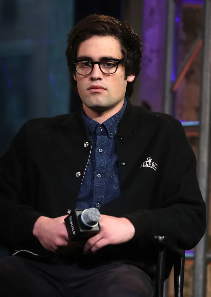 Nick Reiner attending the AOL Build Speaker Series, holding a microphone.