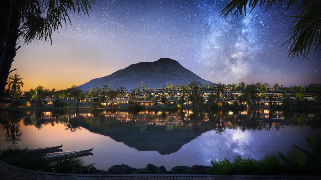 Illustration of a night lake with a starry sky, a mountain, and buildings with lights reflecting on the water.