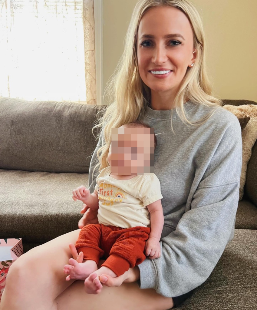 Kelsey Fitzsimmons holding her baby.