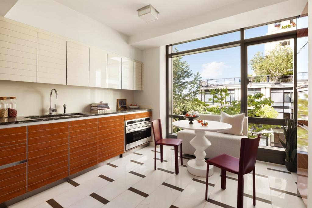 The windowed kitchen is a delight.