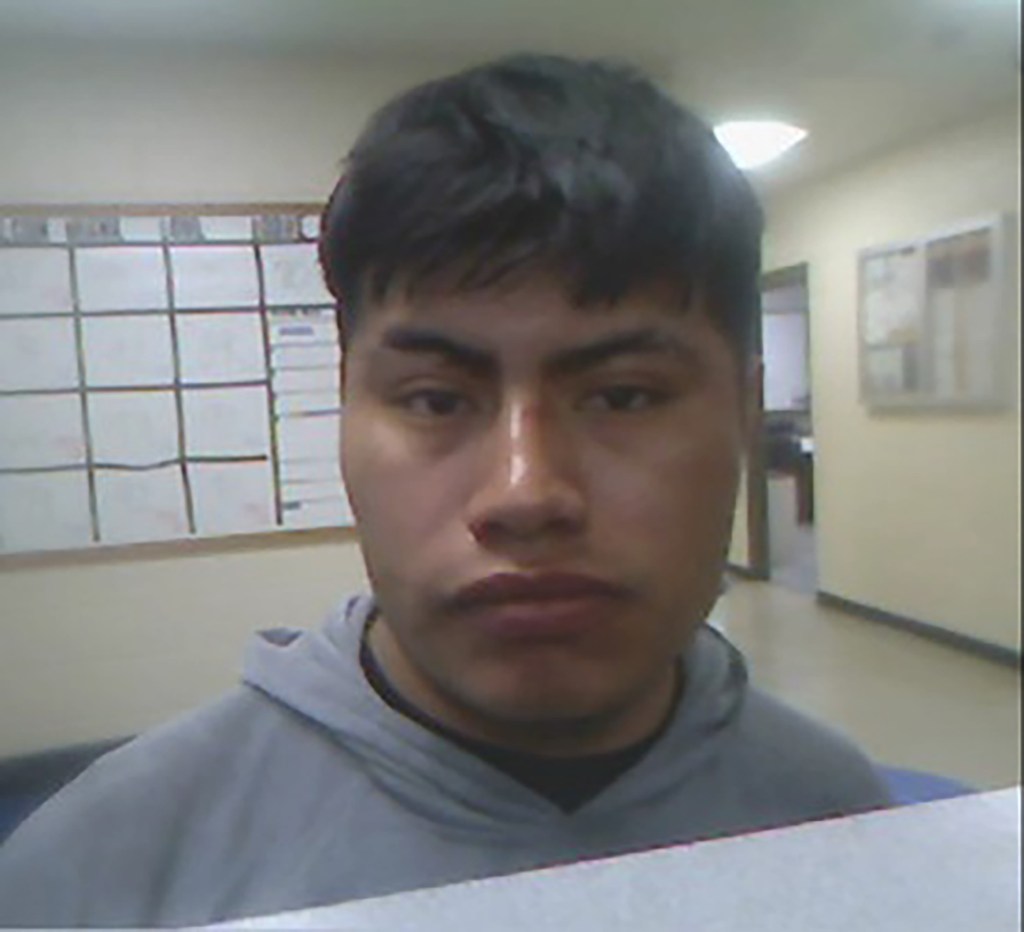 Maximiliano Perez-Perez, a man with dark hair, looking forward in a photo taken indoors.