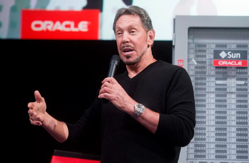Oracle CEO Larry Ellison speaking into a microphone.